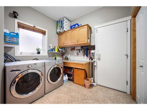 29 Panorama Hills Heights Nw, Calgary, AB - Indoor Photo Showing Laundry Room