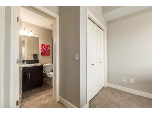 3206-15 Sunset Square, Cochrane, AB - Indoor Photo Showing Other Room