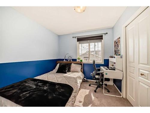 2442 Kingsland Road Se, Airdrie, AB - Indoor Photo Showing Bedroom