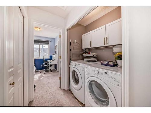 2442 Kingsland Road Se, Airdrie, AB - Indoor Photo Showing Laundry Room