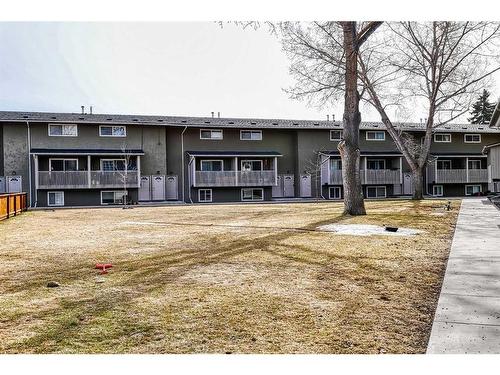 30-8112 36 Avenue Nw, Calgary, AB - Outdoor With Deck Patio Veranda With Facade