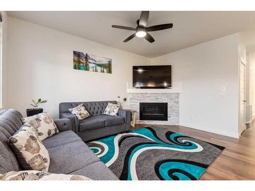 4512 84 Avenue Ne, Calgary, AB - Indoor Photo Showing Living Room With Fireplace