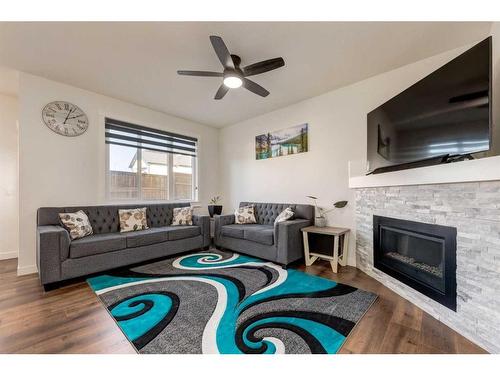 4512 84 Avenue Ne, Calgary, AB - Indoor Photo Showing Living Room With Fireplace