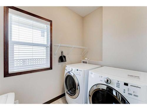 621 Cavendish Beach Bay, Chestermere, AB - Indoor Photo Showing Laundry Room