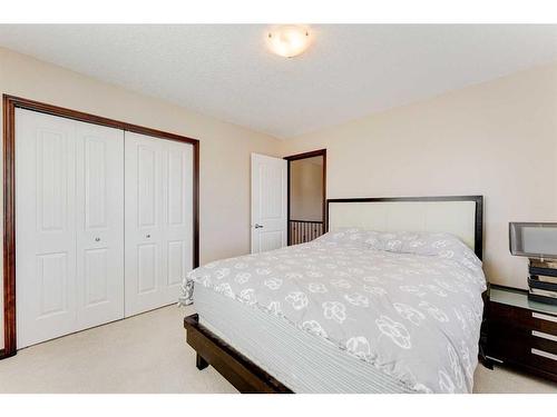 621 Cavendish Beach Bay, Chestermere, AB - Indoor Photo Showing Bedroom