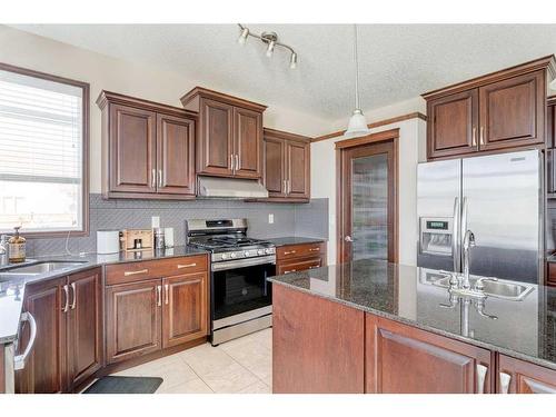 621 Cavendish Beach Bay, Chestermere, AB - Indoor Photo Showing Kitchen With Stainless Steel Kitchen