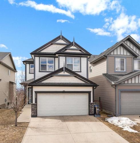 233 Sunset Heights, Cochrane, AB - Outdoor With Facade