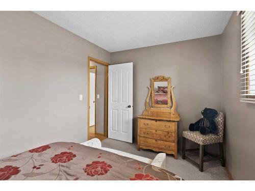 41 Sprucegrove Crescent Se, Airdrie, AB - Indoor Photo Showing Bedroom