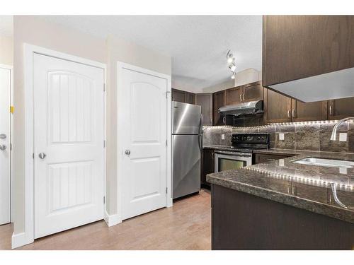 9-211 Village Terrace Sw, Calgary, AB - Indoor Photo Showing Kitchen With Stainless Steel Kitchen