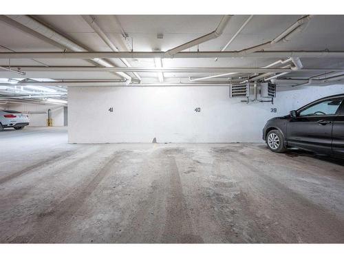 107-540 34 Street Nw, Calgary, AB - Indoor Photo Showing Garage