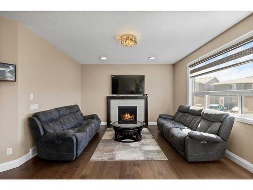 39 Cornerstone Gardens Ne, Calgary, AB - Indoor Photo Showing Living Room With Fireplace