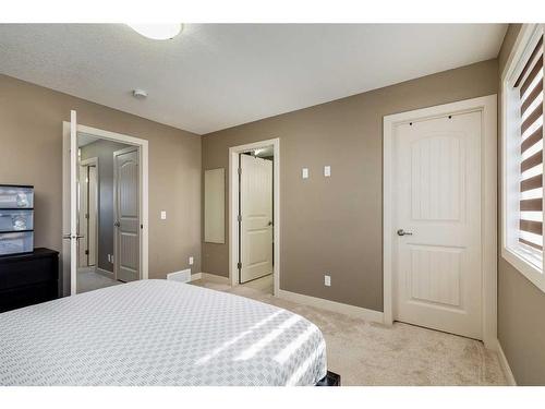 1054 Carrington Boulevard Nw, Calgary, AB - Indoor Photo Showing Bedroom