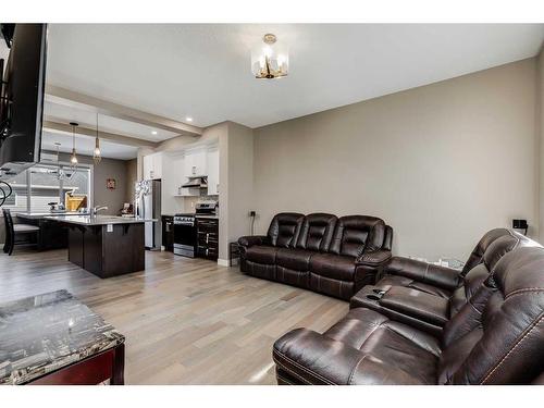 1054 Carrington Boulevard Nw, Calgary, AB - Indoor Photo Showing Living Room