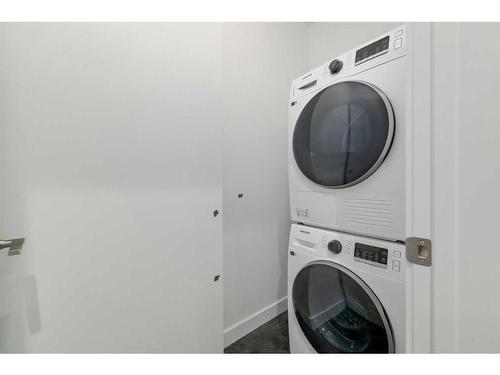 106-1319 14 Avenue Sw, Calgary, AB - Indoor Photo Showing Laundry Room