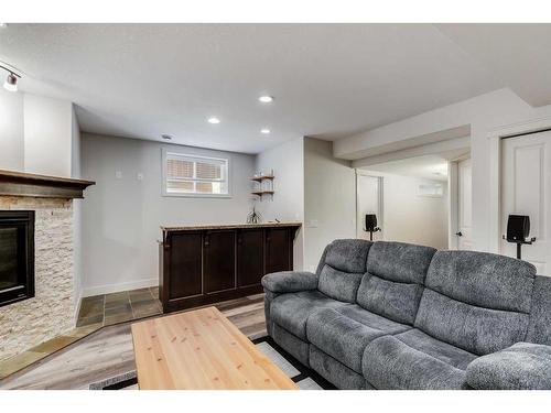 906 33 Street Nw, Calgary, AB - Indoor Photo Showing Other Room With Fireplace