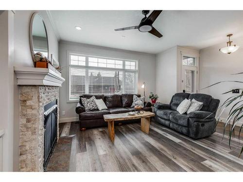 906 33 Street Nw, Calgary, AB - Indoor Photo Showing Living Room With Fireplace