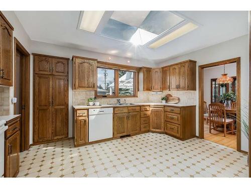 58 Butler Crescent Nw, Calgary, AB - Indoor Photo Showing Kitchen With Double Sink