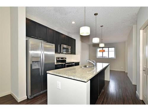 109 Copperpond Row Se, Calgary, AB - Indoor Photo Showing Kitchen With Stainless Steel Kitchen With Upgraded Kitchen