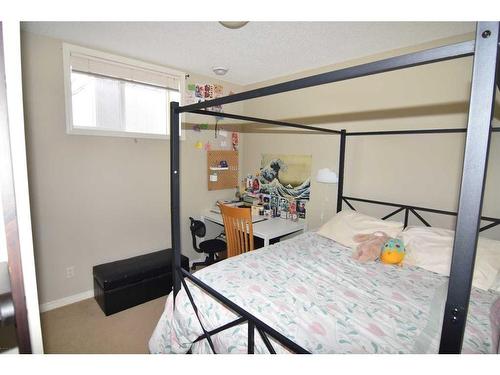 310 Ranch Garden, Strathmore, AB - Indoor Photo Showing Bedroom