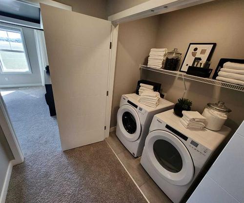 280 Belmont Boulevard Sw, Calgary, AB - Indoor Photo Showing Laundry Room