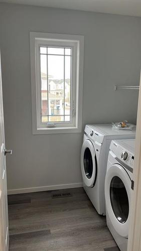 187 Carringham Road Nw, Calgary, AB - Indoor Photo Showing Laundry Room