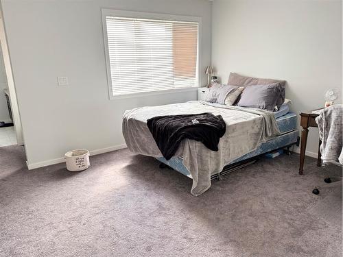 187 Carringham Road Nw, Calgary, AB - Indoor Photo Showing Bedroom