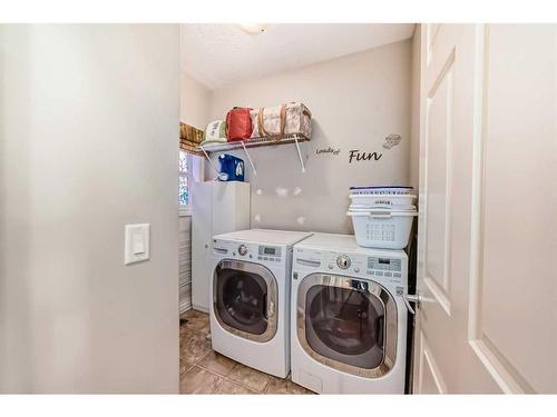 51 Billy Haynes Trail, Okotoks, AB - Indoor Photo Showing Laundry Room
