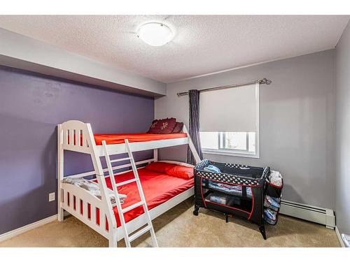 1306-175 Panatella Hill Nw, Calgary, AB - Indoor Photo Showing Bedroom