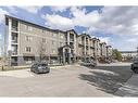1306-175 Panatella Hill Nw, Calgary, AB  - Outdoor With Balcony With Facade 