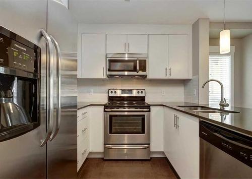 4315-240 Skyview Ranch Road Ne, Calgary, AB - Indoor Photo Showing Kitchen With Double Sink With Upgraded Kitchen