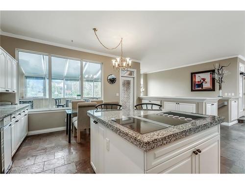 912 Memorial Drive Nw, Calgary, AB - Indoor Photo Showing Kitchen With Double Sink