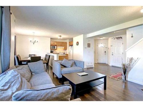 98 Saddleback Road Ne, Calgary, AB - Indoor Photo Showing Living Room