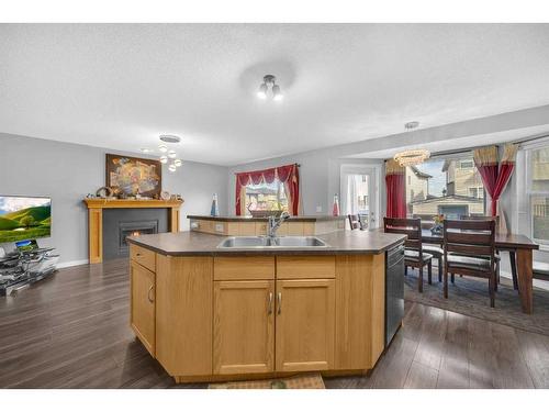 16 Saddlecrest Green Ne, Calgary, AB - Indoor Photo Showing Kitchen With Double Sink