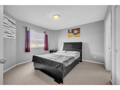 16 Saddlecrest Green Ne, Calgary, AB - Indoor Photo Showing Bedroom