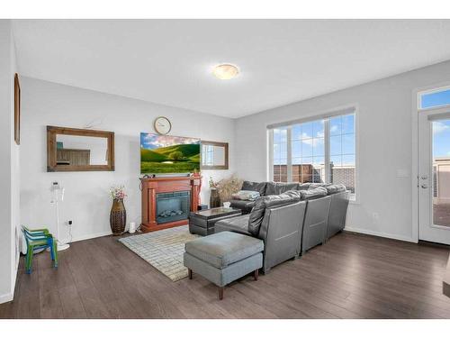 13 Cityside Link Ne, Calgary, AB - Indoor Photo Showing Living Room With Fireplace