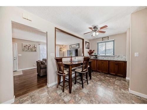 1328 Pennsburg Road Se, Calgary, AB - Indoor Photo Showing Dining Room