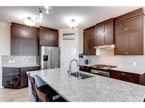 39 Silverado Skies Manor Sw, Calgary, AB - Indoor Photo Showing Kitchen With Stainless Steel Kitchen With Upgraded Kitchen