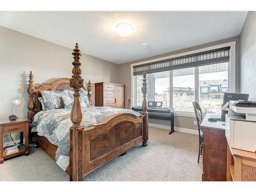 142 Waters Edge Drive, Heritage Pointe, AB - Indoor Photo Showing Bedroom