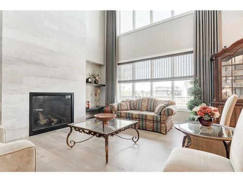 142 Waters Edge Drive, Heritage Pointe, AB - Indoor Photo Showing Living Room With Fireplace