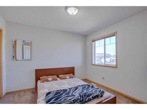 77 Taralea Green Ne, Calgary, AB - Indoor Photo Showing Bedroom