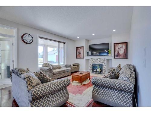 77 Taralea Green Ne, Calgary, AB - Indoor Photo Showing Living Room With Fireplace