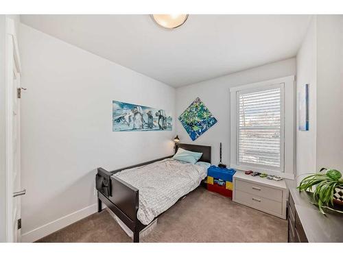 1612 Bowness Road Nw, Calgary, AB - Indoor Photo Showing Bedroom