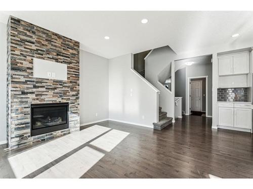 29 Nolanhurst Heights Nw, Calgary, AB - Indoor Photo Showing Living Room With Fireplace