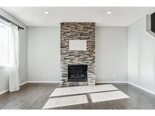 29 Nolanhurst Heights Nw, Calgary, AB - Indoor Photo Showing Living Room With Fireplace