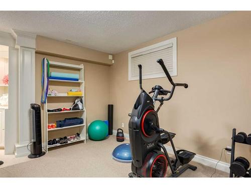 74 Discovery Ridge Road Sw, Calgary, AB - Indoor Photo Showing Gym Room