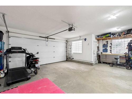 171 Sunterra Ridge Place, Cochrane, AB - Indoor Photo Showing Garage