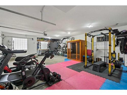 171 Sunterra Ridge Place, Cochrane, AB - Indoor Photo Showing Gym Room