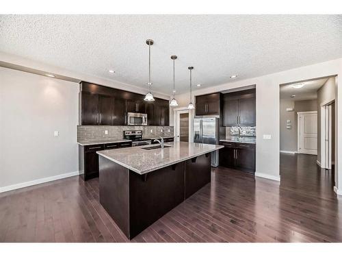 554 Sherwood Boulevard Nw, Calgary, AB - Indoor Photo Showing Kitchen With Stainless Steel Kitchen With Upgraded Kitchen