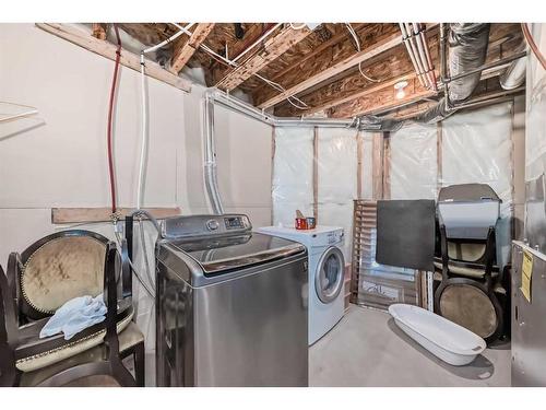112 Everglen Way Sw, Calgary, AB - Indoor Photo Showing Laundry Room