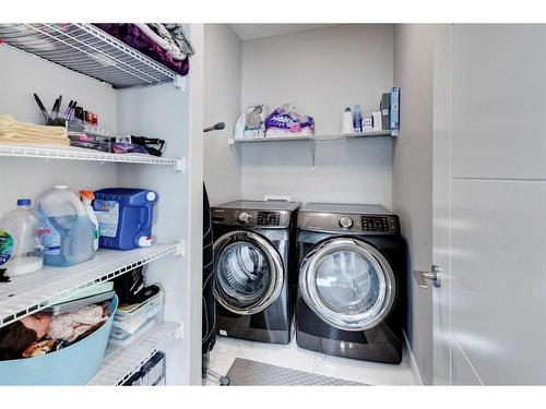 31 Sherview Grove Nw, Calgary, AB - Indoor Photo Showing Laundry Room
